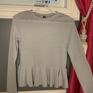 Sparkly long sleeve peplum top